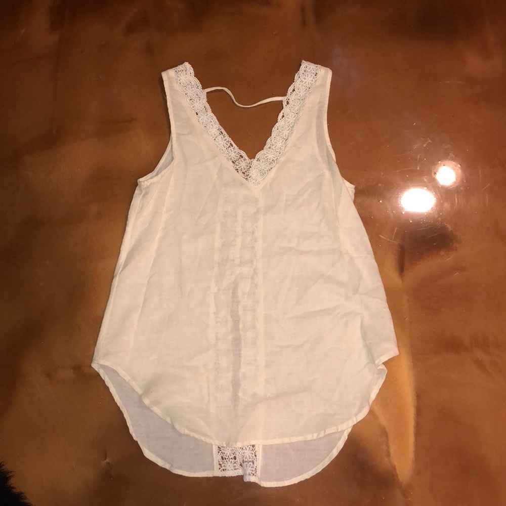 Sleeveless, open flow back, Lacey